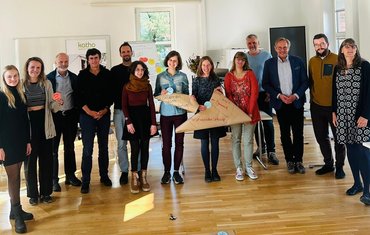 Teilnehmer_innen präsentieren Arbeitsergebnisse