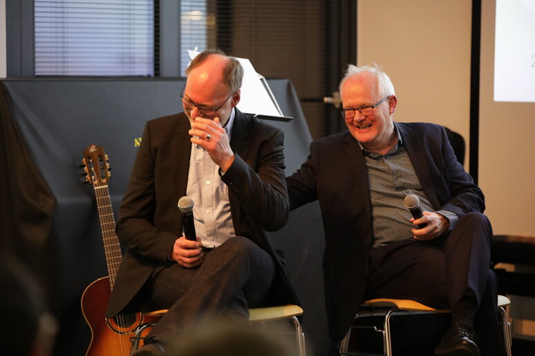 Jörg Baur und Christof lachen beide