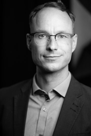 Das Bild zeigt ein Portrait von Markus Baum.