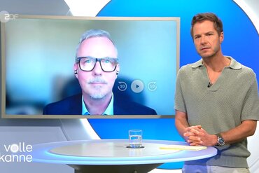 Prof. Dr. Michael Isfort im ZDF-Interview mit Moderator.